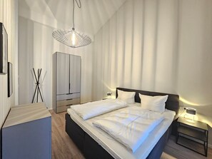 2 slaapkamers, een strijkplank/strijkijzer, wifi