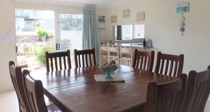Two Pines - a cosy beach-style cottage full of fun surprises!