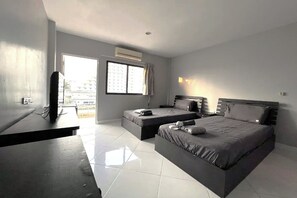 Deluxe Room, Balcony, Partial Sea View | Desk, blackout drapes, soundproofing, free WiFi