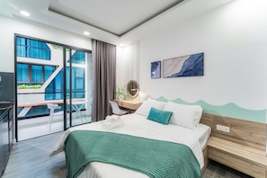 Basic Studio, 1 Queen Bed, Balcony, Beachside | Desk, laptop workspace, blackout drapes, free WiFi