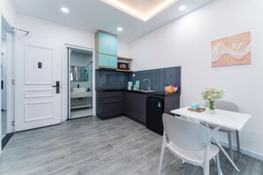 Twin Room, 1 Queen Bed, Kitchen, Beachside | Living area | TV - Annie House (Nha Trang)