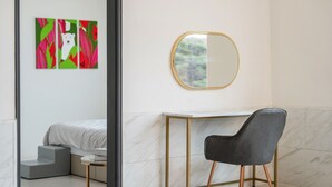 A modern bedroom with a bed, a desk, a chair, and a mirror. - Gyeongju Purspet Dog Pension (Gyeongju)