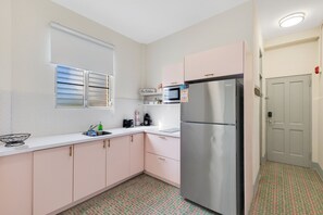 Fridge, microwave, coffee/tea maker, toaster