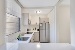 Fridge, microwave, coffee/tea maker, toaster