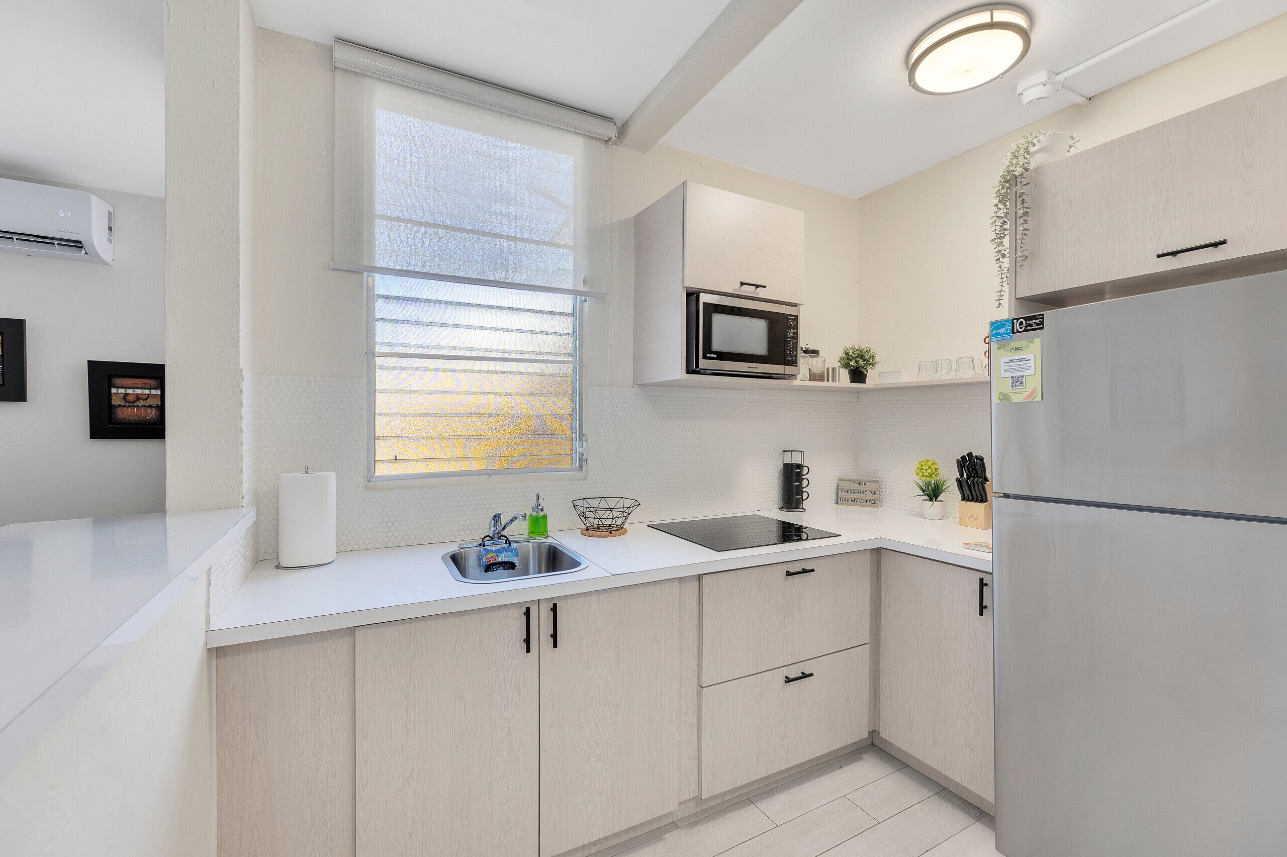 Fridge, microwave, coffee/tea maker, toaster