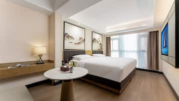 Family Triple Room, City View | 1 bedroom, laptop workspace, blackout drapes, free WiFi