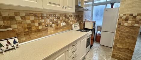 Fridge, microwave, coffee/tea maker, electric kettle