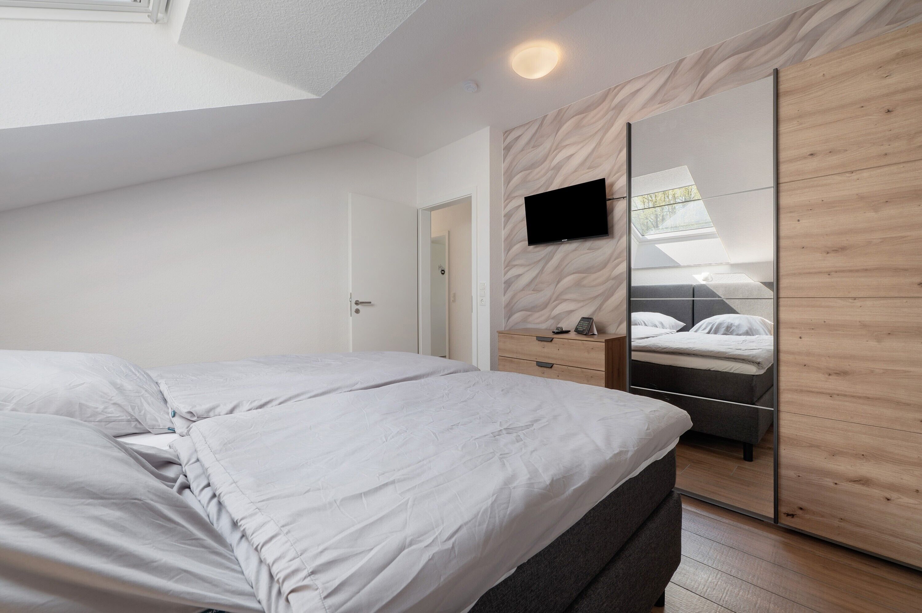 2 dormitorios, tabla de planchar con plancha, wifi gratis y ropa de cama