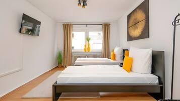 2 habitaciones, tabla de planchar con plancha y wifi gratis