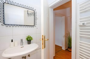 Ducha, secador de pelo, toallas