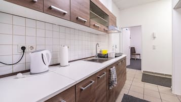 Fridge, microwave, cookware/dishes/utensils, spices