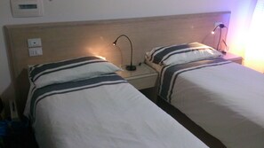2 bedrooms, desk, iron/ironing board, travel crib