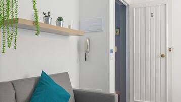 Full-sized fridge, microwave, stovetop, cookware/dishes/utensils