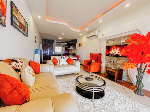 Standard Apartment, Balcony, Beach View | Living room