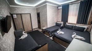 Comfort Quadruple Room, City View | Desk, laptop workspace, free WiFi - Madera Hotel (Tashkent)