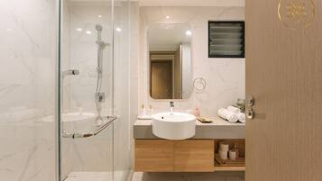 Shower, hair dryer, towels, soap