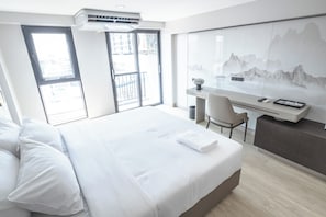 Habitación Deluxe | Ropa de cama hipoalergénica, escritorio, wifi gratis y ropa de cama 