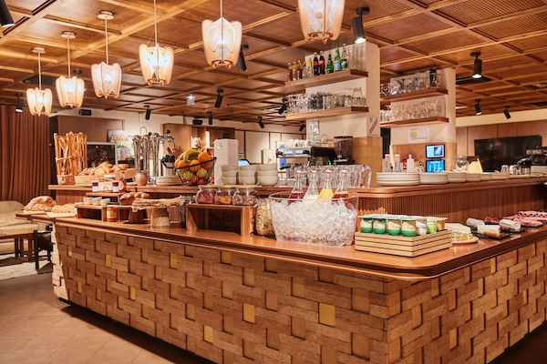 Daily buffet breakfast (EUR 16 per person)