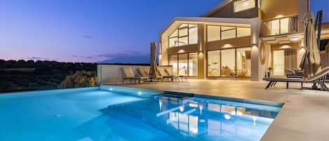 Outdoor pool, pool umbrellas, pool loungers
