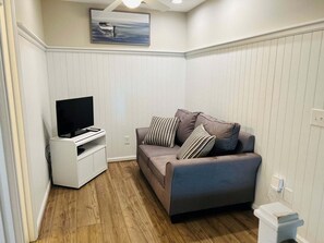 Smart TV - Experience oceanfront luxury at FINS, a spacious 10-bedroom retreat in Holden Beach. (Holden Beach)