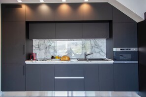 Fridge, microwave, stovetop, coffee/tea maker