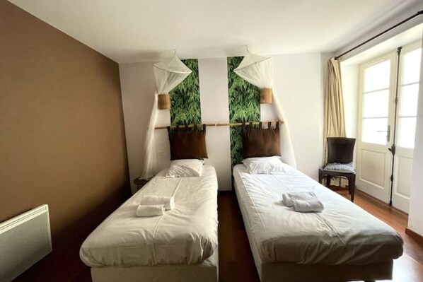 1 chambre, fer et planche à repasser, Wi-Fi, draps fournis