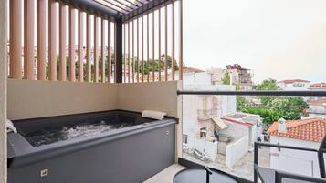 Deluxe Suite, Pool View | Terrace/patio