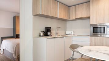 Apartment, 1 Bedroom, Terrace, Sea View | Private kitchen | Fridge, microwave, stovetop, dishwasher