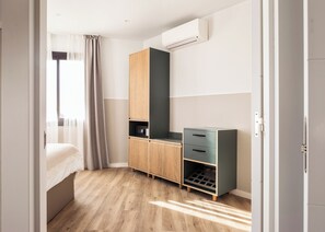 Premium Apartment, 1 Bedroom, Terrace, Sea View | In-room safe, iron/ironing board, free WiFi, bed sheets