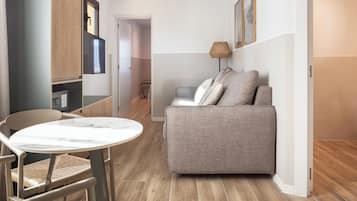 Departamento, 1 habitación | Área de sala de estar