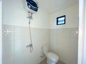 Shower, slippers, towels, soap