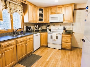 Microwave, stovetop, dishwasher, coffee/tea maker