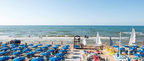 Private beach, sun-loungers, beach umbrellas, beach volleyball