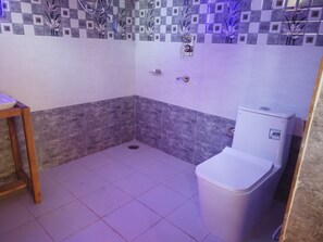 Shower, towels, soap, shampoo