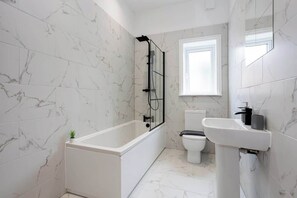 Shower, hair dryer, shampoo