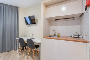 Fridge, microwave, stovetop, coffee/tea maker