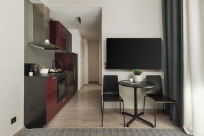 Estudi Deluxe | Habitacions insonoritzades, planxa i posts de planxar i wifi gratuïta 
