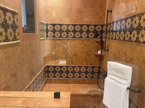 Jetted tub, hair dryer, towels, soap