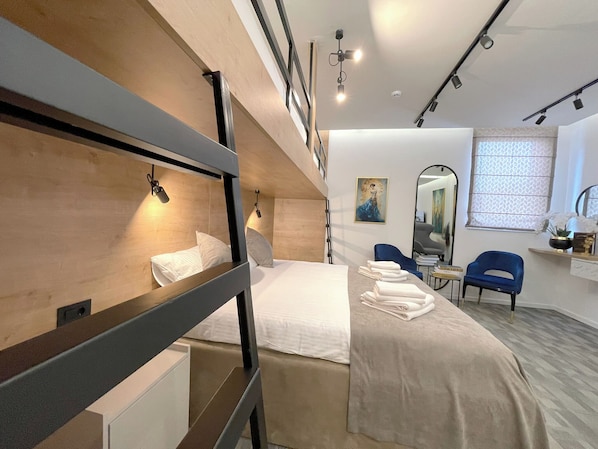 Comfort Quadruple Room | In-room safe, free WiFi