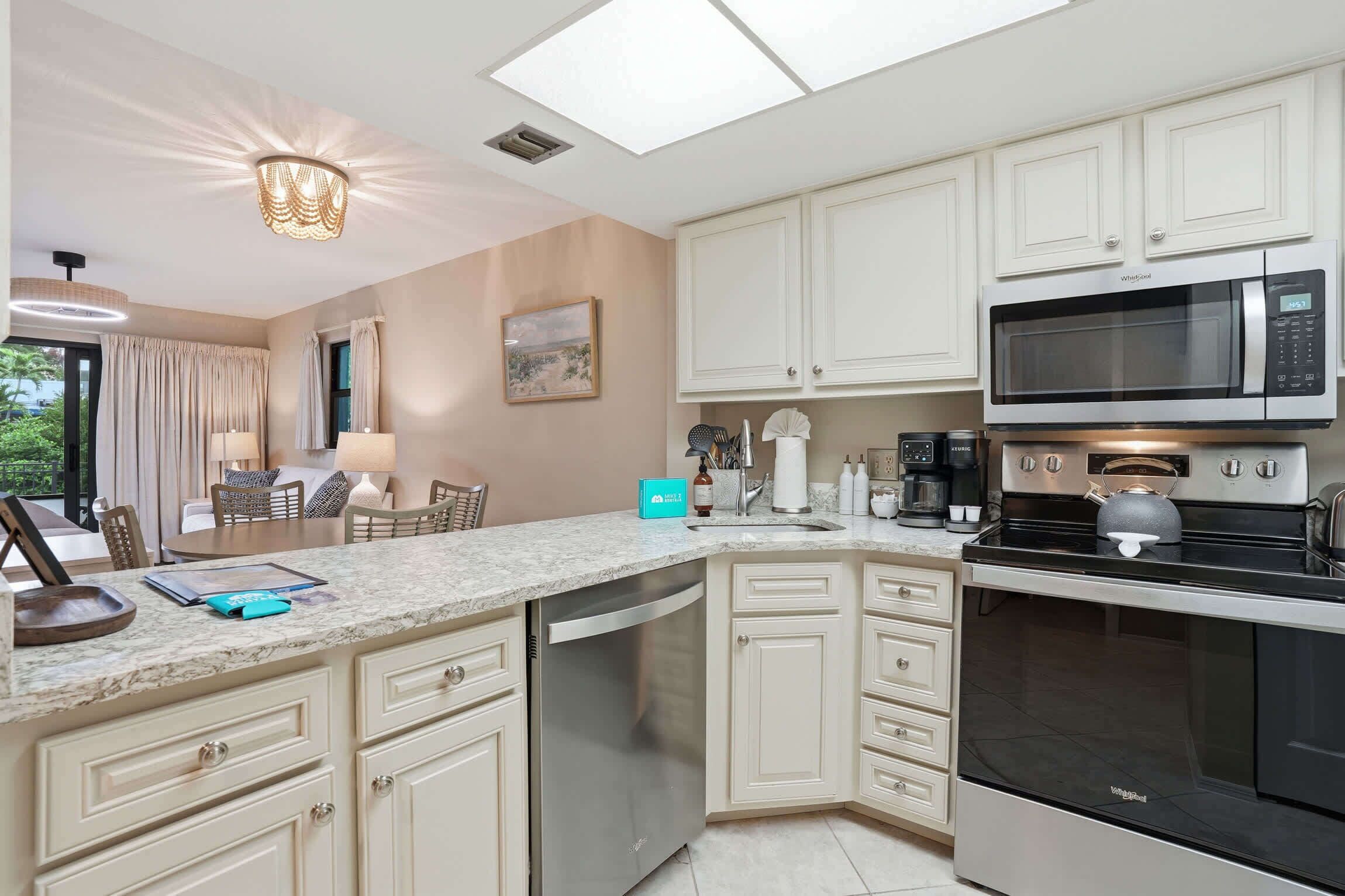Coffee/tea maker, fridge, microwave, oven