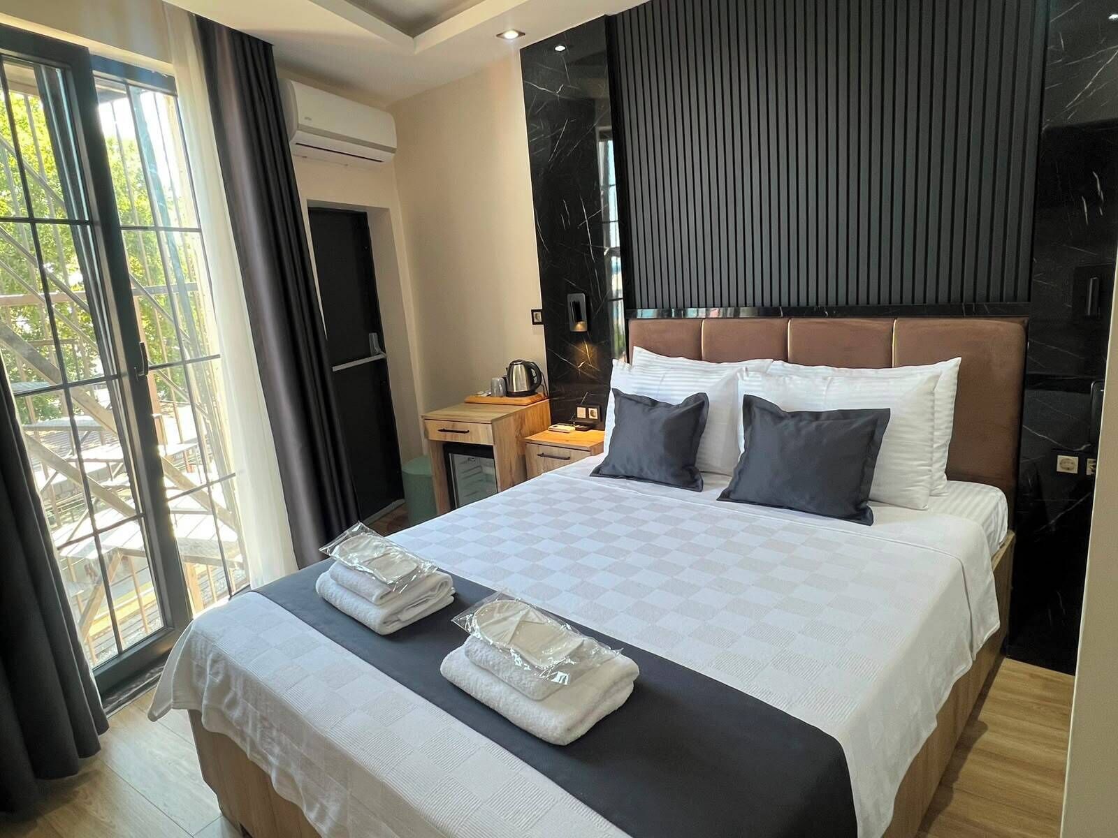 Economy Double Room, Sea View | Desk, blackout drapes, iron/ironing board, WiFi (free)
