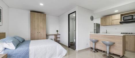 1 bedroom, desk, iron/ironing board, travel cot