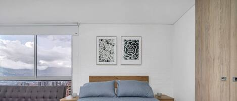 1 bedroom, desk, iron/ironing board, travel crib