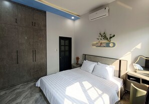 Family Room | 1 bedroom, desk, blackout drapes, iron/ironing board