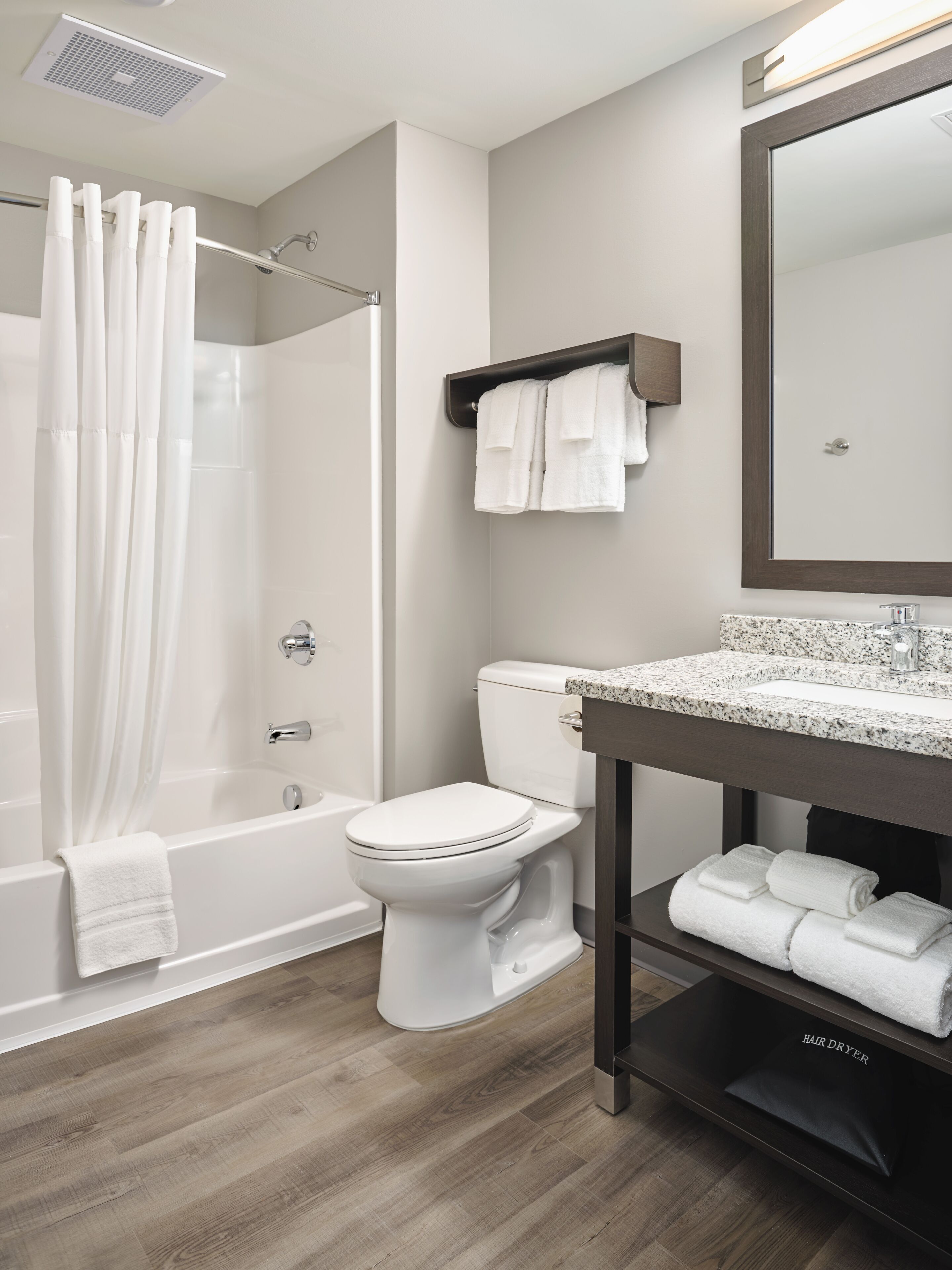 Combined shower/bathtub, hair dryer, towels, soap
