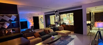 Charming 2-bedroom condo in Muscat with WiFi, fitness room, AC