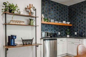 Fridge, microwave, coffee/tea maker, toaster