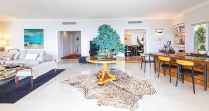 Sophisticated Coastal Elegance: Luxurious 4-Bedroom Condo Apartment
