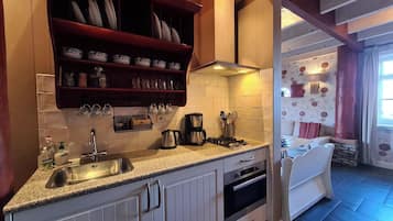 Fridge, stovetop, coffee/tea maker, high chair