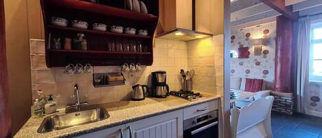 Fridge, stovetop, coffee/tea maker, highchair